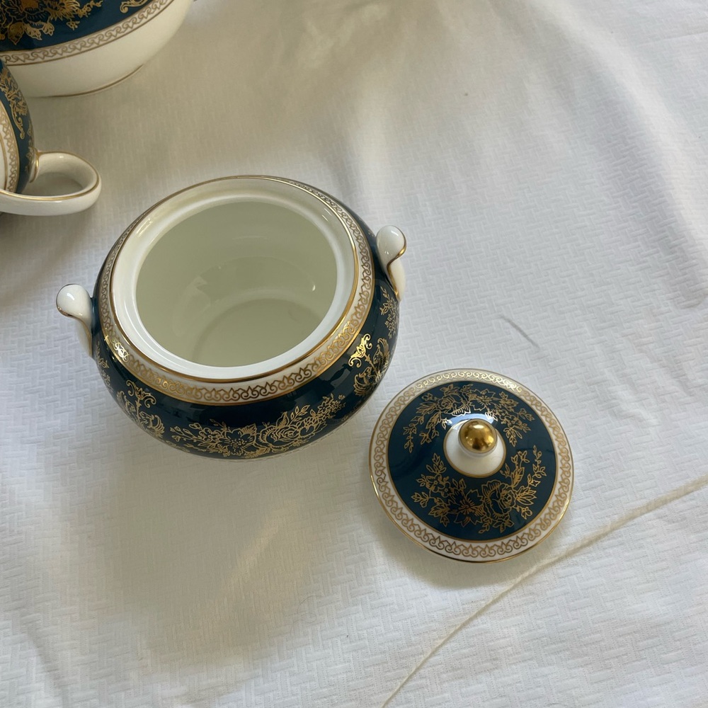 Dinner set for eight + tea server and a serving plate